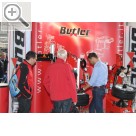 Wessels+Müller Werkstattmesse 2015 FMO Vorfhrung einer BUTLER Reifenmontiermaschine auf der Wessels+Mller Werkstattmesse 2015.  